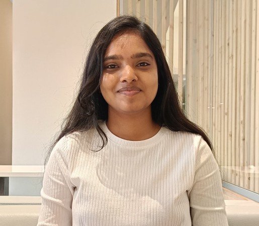 Bharathi smiling in front of camera